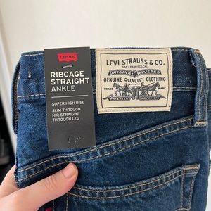 Beautiful Levi’s the perfect color + vegan never been worn
